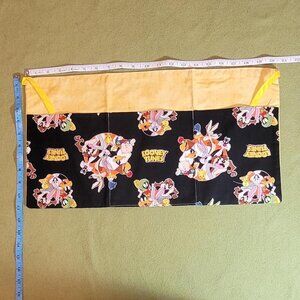 Yellow and black Looney Tunes print apron with 3 pockets #LooneyTunes #Apron